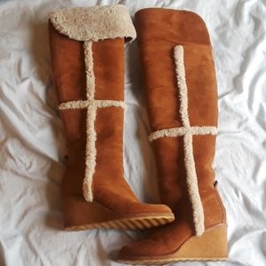 Tory Burch suede shearling over the knee boots.
